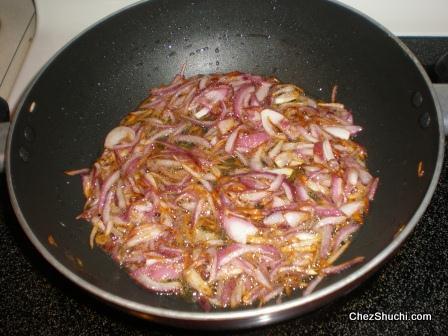 onion juliennes frying 